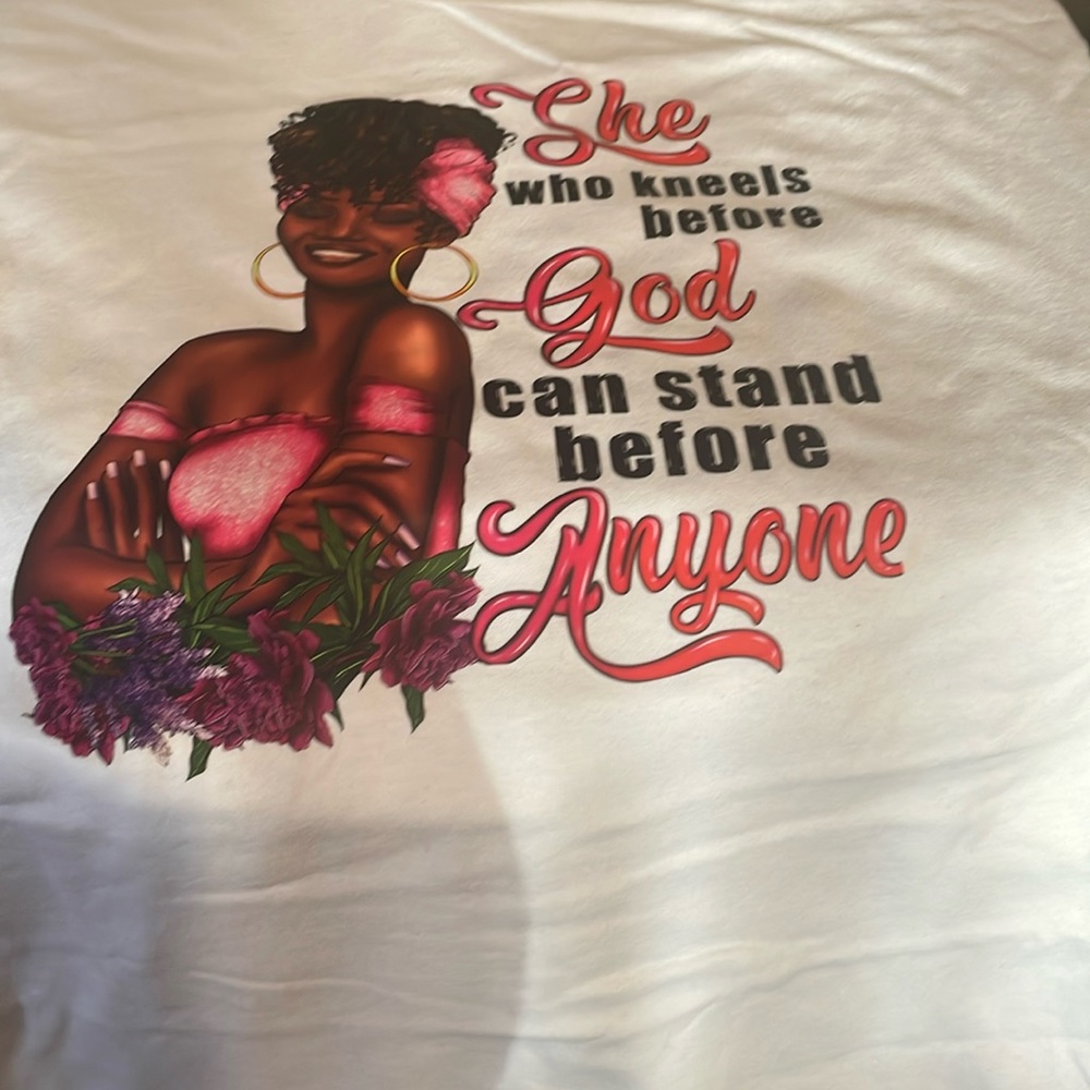 A medium, white, Christian, short sleeved t-shirt.